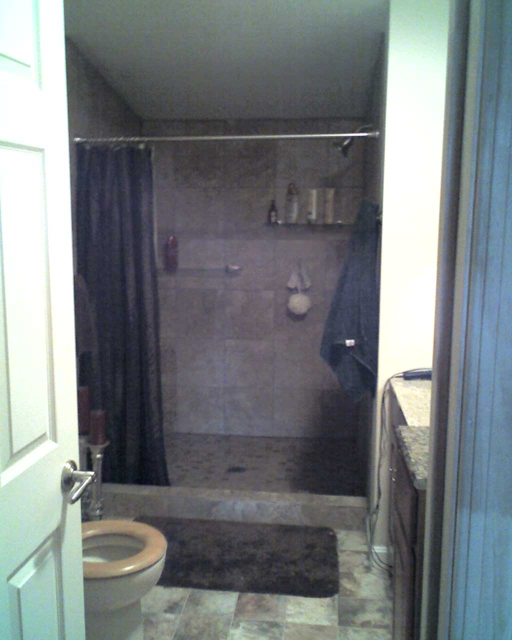 Bathroom remodel with a tiled walk-in shower
